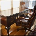 F12. Hekman Furniture leather top desk with claw feet. 31"h x 58"w x 29"d 
